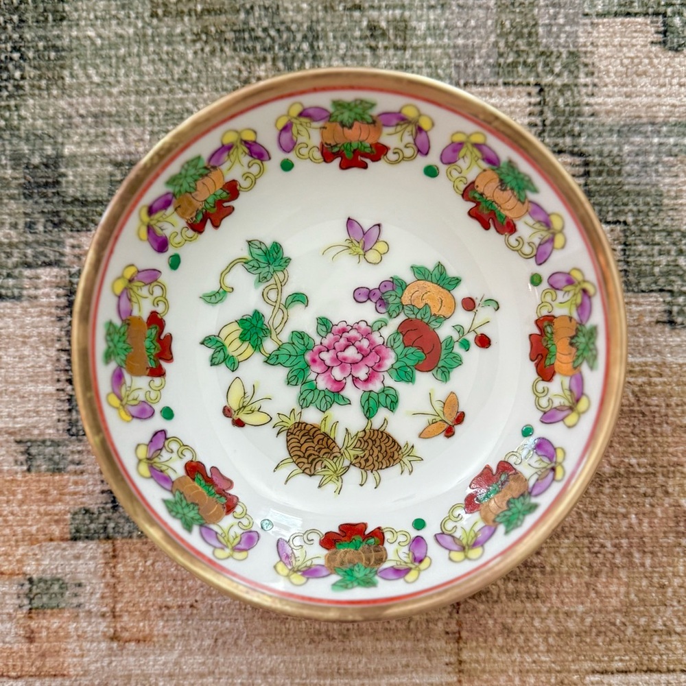 Vintage brass encased famille rose chinoiserie bowl